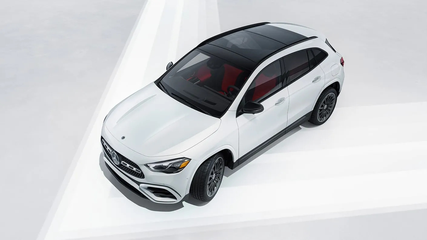 Top-down view of the 2026 Mercedes-Benz GLC Hybrid for sale featuring a panoramic glass roof and sporty proportions.
