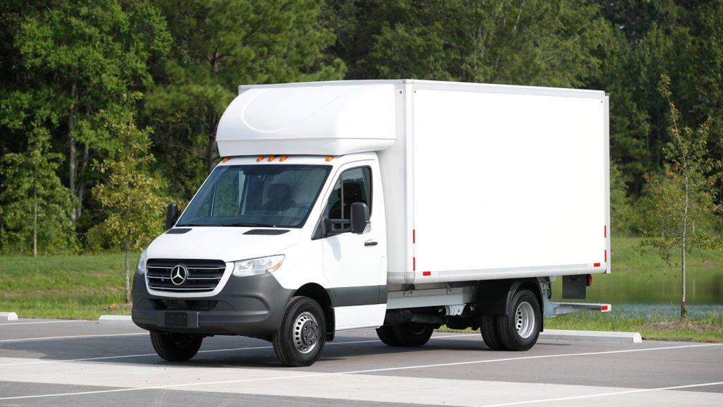 A white 2026 Mercedes-Benz Sprinter box truck parked outdoors, showing its spacious cargo box and commercial-ready design.