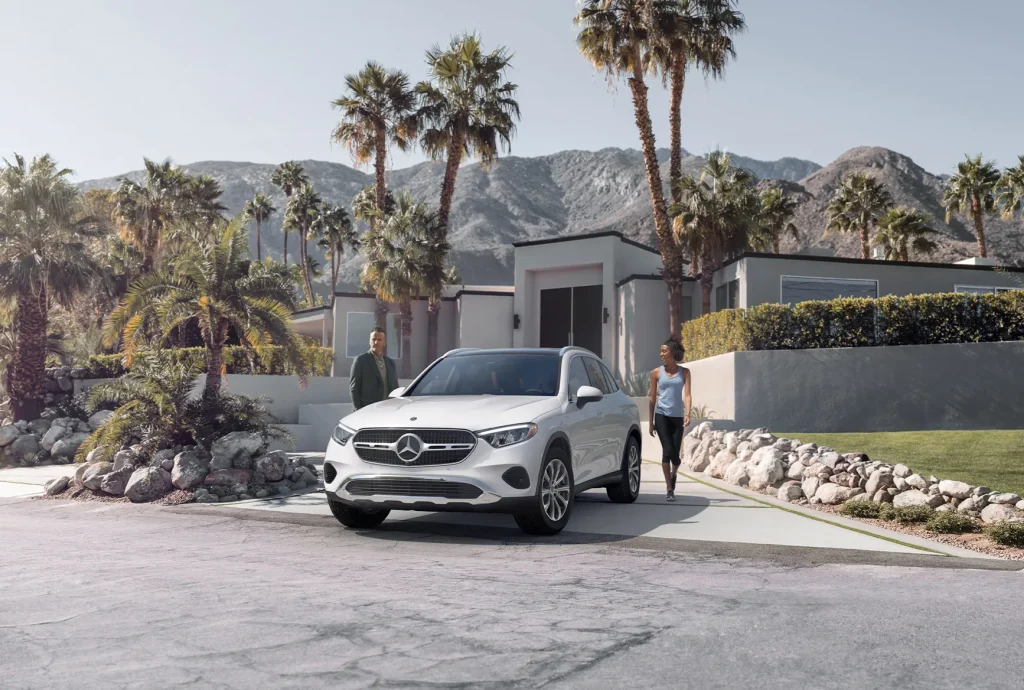 2026 Mercedes-Benz GLC EV parked outside a modern home, showcasing luxury SUV styling ideal for Chicago driving