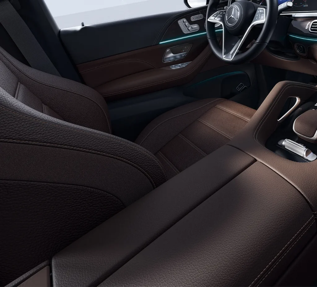 Interior front seats of the 2026 Mercedes-Benz GLE, showcasing premium materials buyers compare with Audi Q7, Audi Q8, and Lexus interiors.
