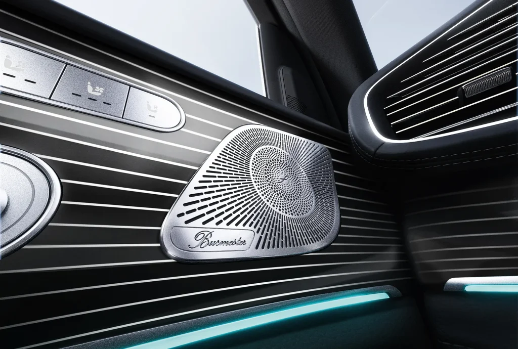Close-up of a premium speaker and door trim inside the 2027 Mercedes-Benz GLE and GLS SUVs, showing luxury materials and ambient lighting.