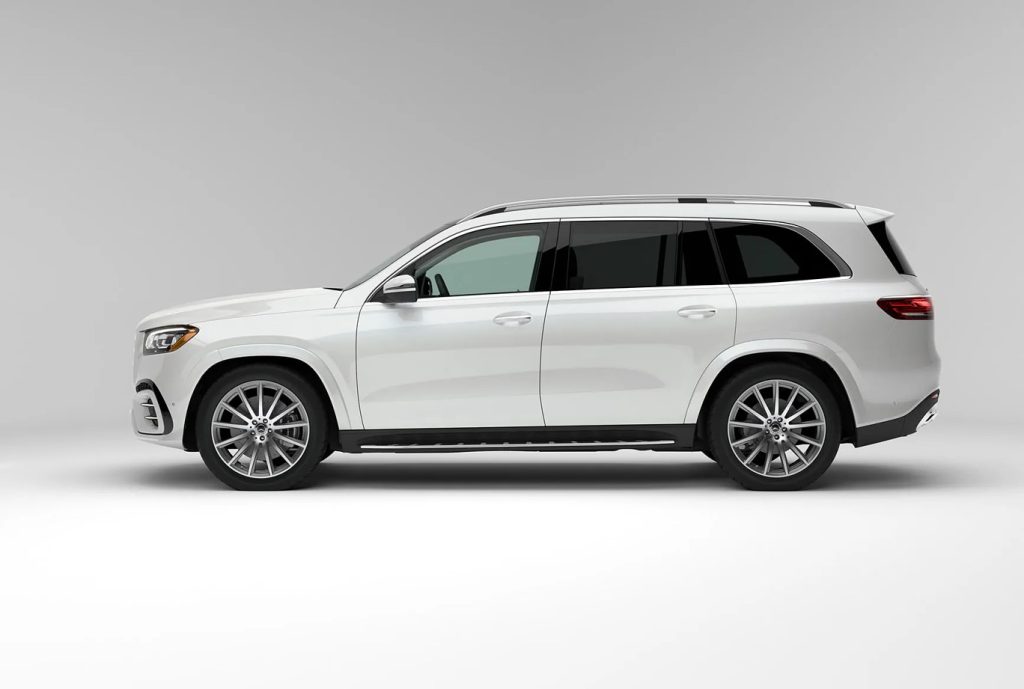 Side view of a Mercedes-Benz family vehicle highlighting warranty coverage and family-friendly design