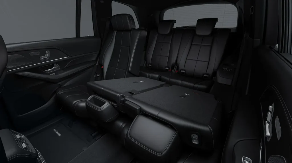 Rear seats inside a Mercedes-Benz GLS showing spacious passenger seating and child-seat-friendly safety features.