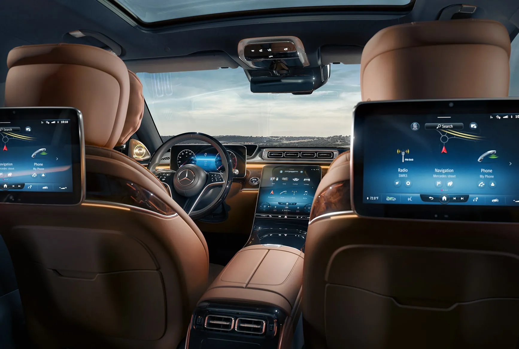 2027 Mercedes-Benz S-Class rear passenger area with seatback entertainment screens and premium leather seats.