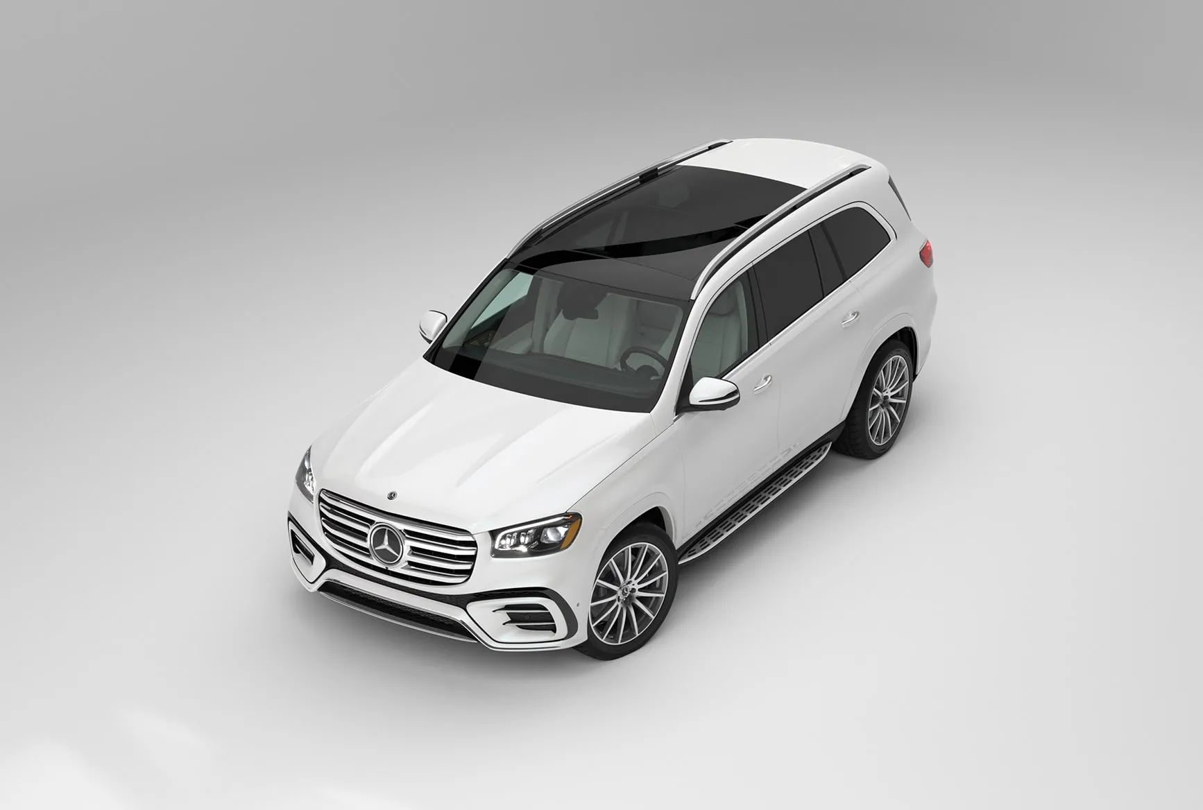 2027 Mercedes-Benz GLS white SUV shown from above with panoramic roof, side steps, and luxury exterior design.