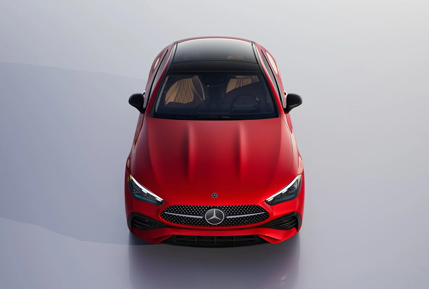 2027 Mercedes-Benz CLE Coupe red front view with sleek coupe styling and Mercedes-Benz grille.