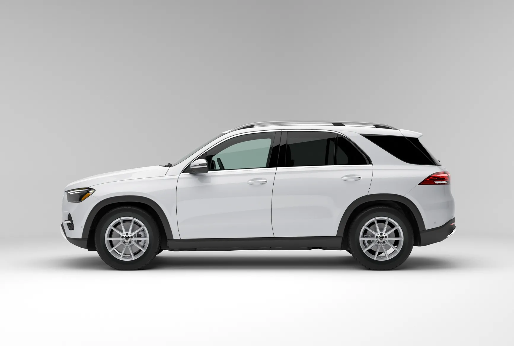 2027 Mercedes-Benz GLE white SUV shown from the side with a clean exterior profile.
