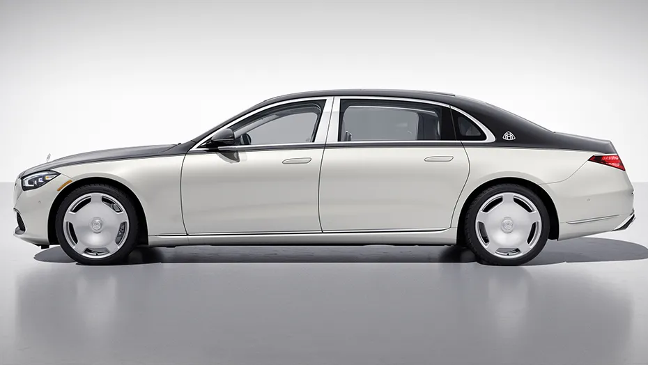 2027 Mercedes-Maybach S-Class luxury sedan shown from the side with two-tone exterior styling and Maybach details.