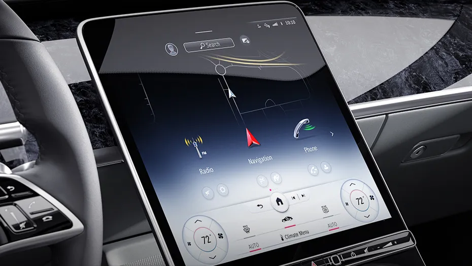 2027 Mercedes-Maybach S-Class central touchscreen showing MBUX navigation, phone, radio, and climate settings.
