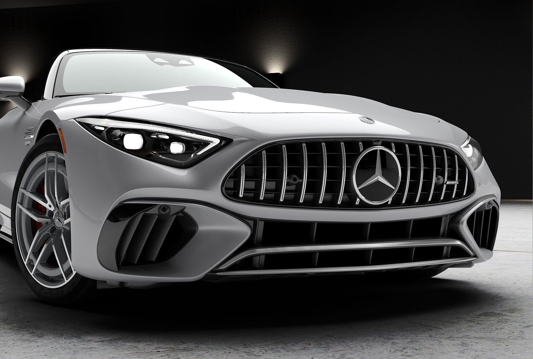 Front view of the silver 2027 Mercedes-Benz AMG SL 55 Roadster with AMG grille.