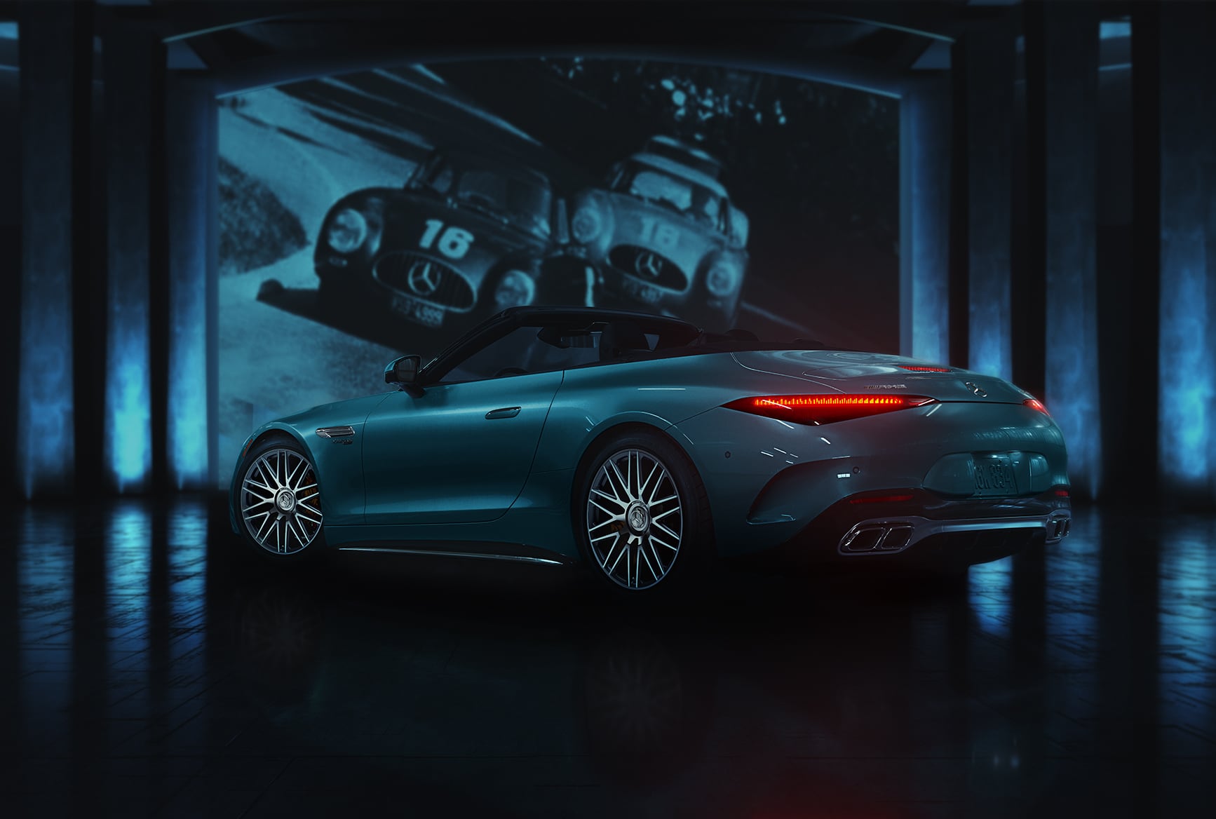 Rear three-quarter view of the 2027 Mercedes-Benz AMG SL 63 Roadster with its top down.