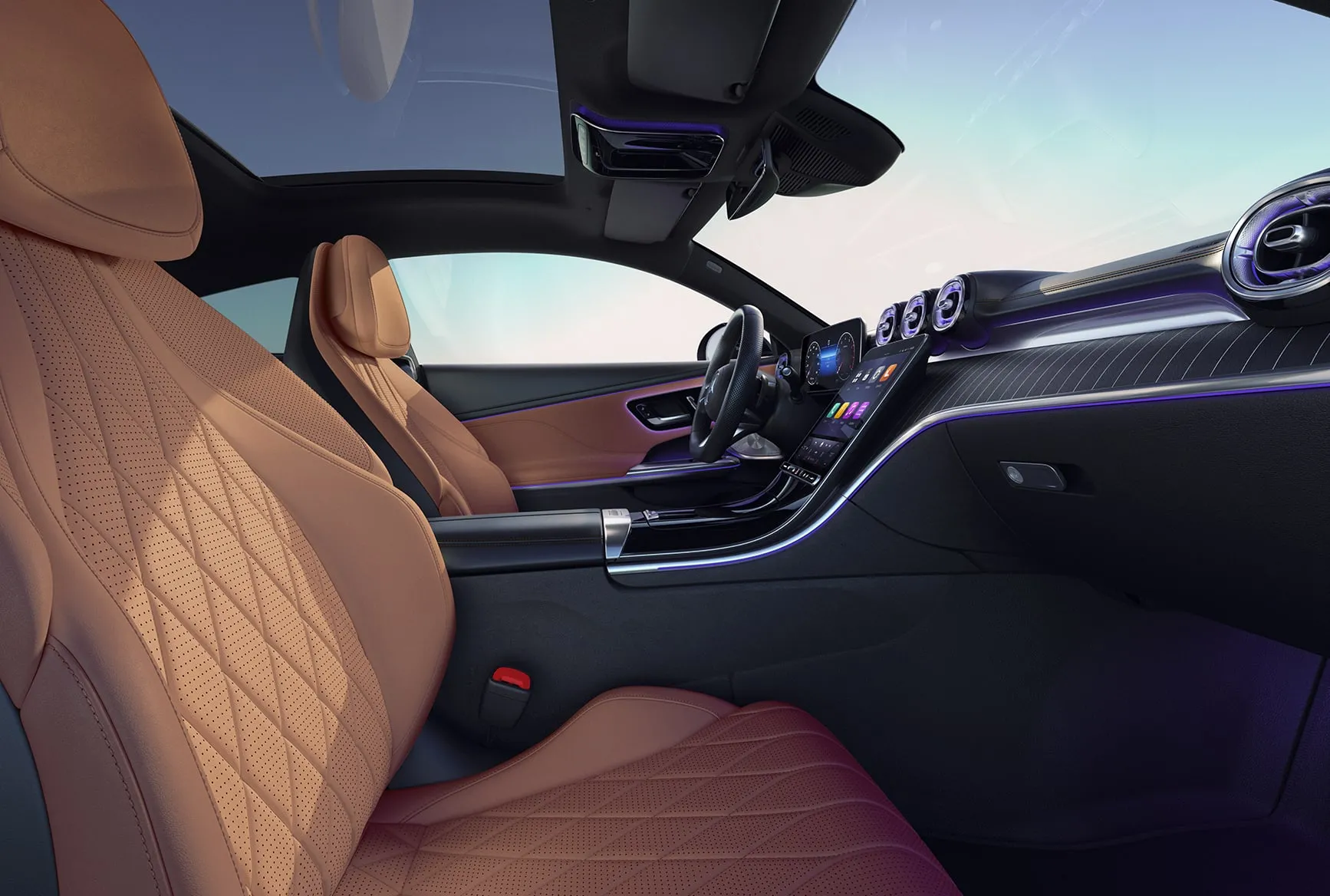 2027 Mercedes-Benz CLE Coupe tan leather front seats with panoramic roof and luxury interior trim.