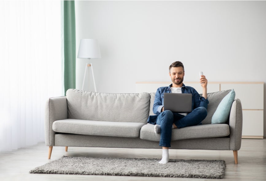 College guy sitting on couch