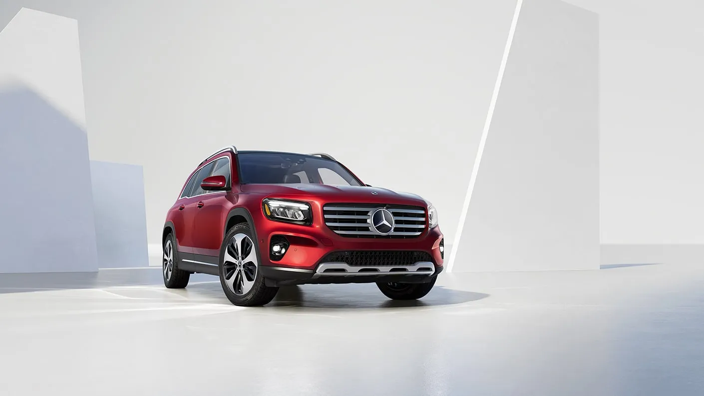 2027 Mercedes-Benz Electric GLB SUV exterior front view in red.