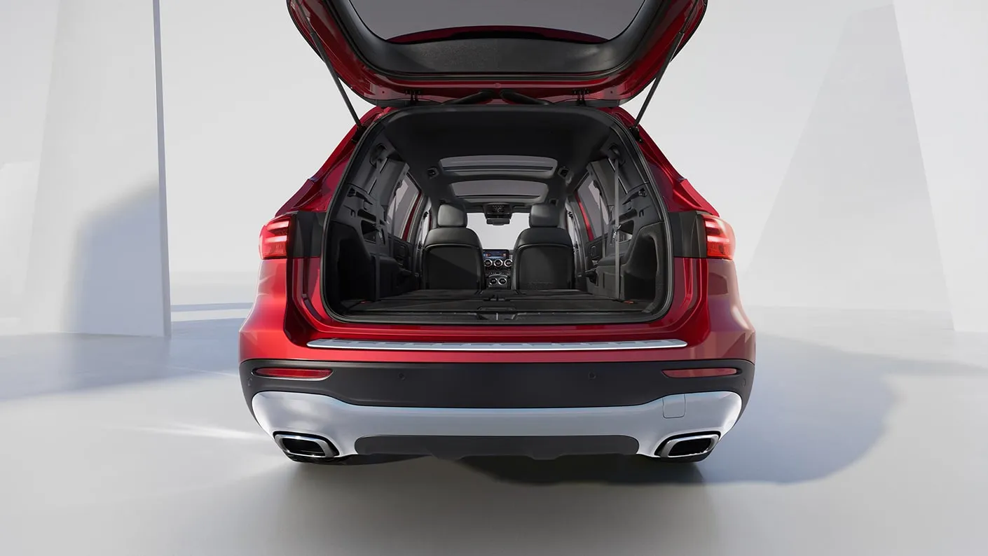 2027 Mercedes-Benz Electric GLB SUV rear cargo space with open tailgate.