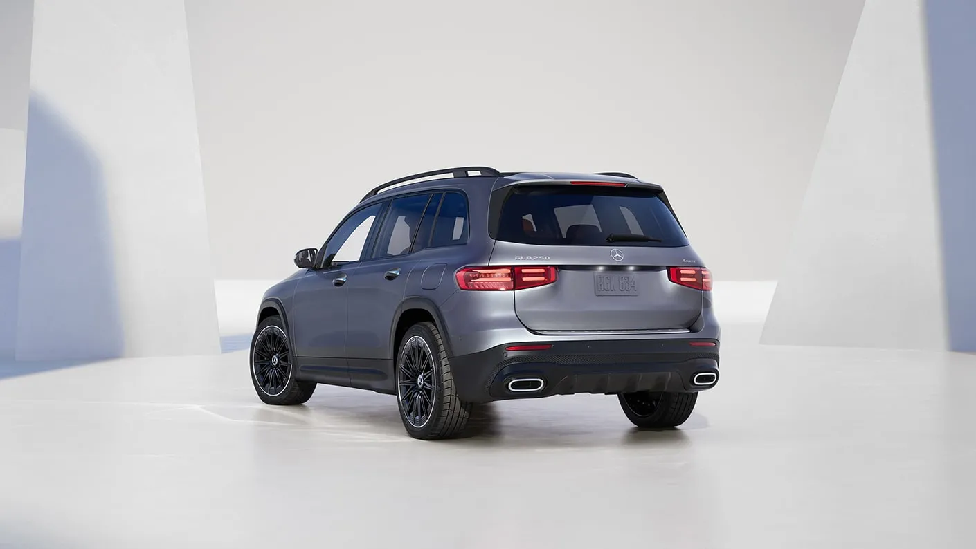 2027 Mercedes-Benz Electric GLB SUV rear exterior view in gray.