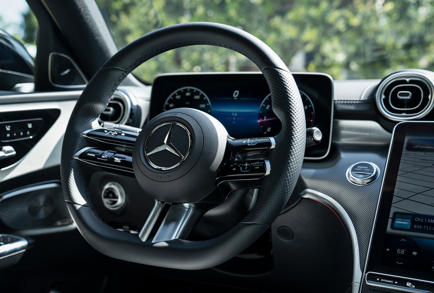 2027 Mercedes-Benz C-Class Sedan steering wheel and digital cockpit with modern dashboard technology.