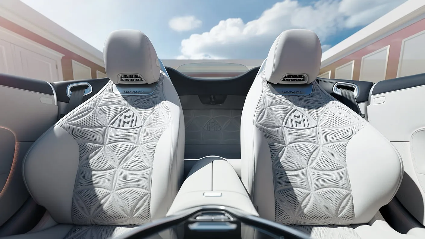 Mercedes-Maybach SL Monogram interior with exclusive white leather seats embossed with Maybach emblem and intricate stitching.