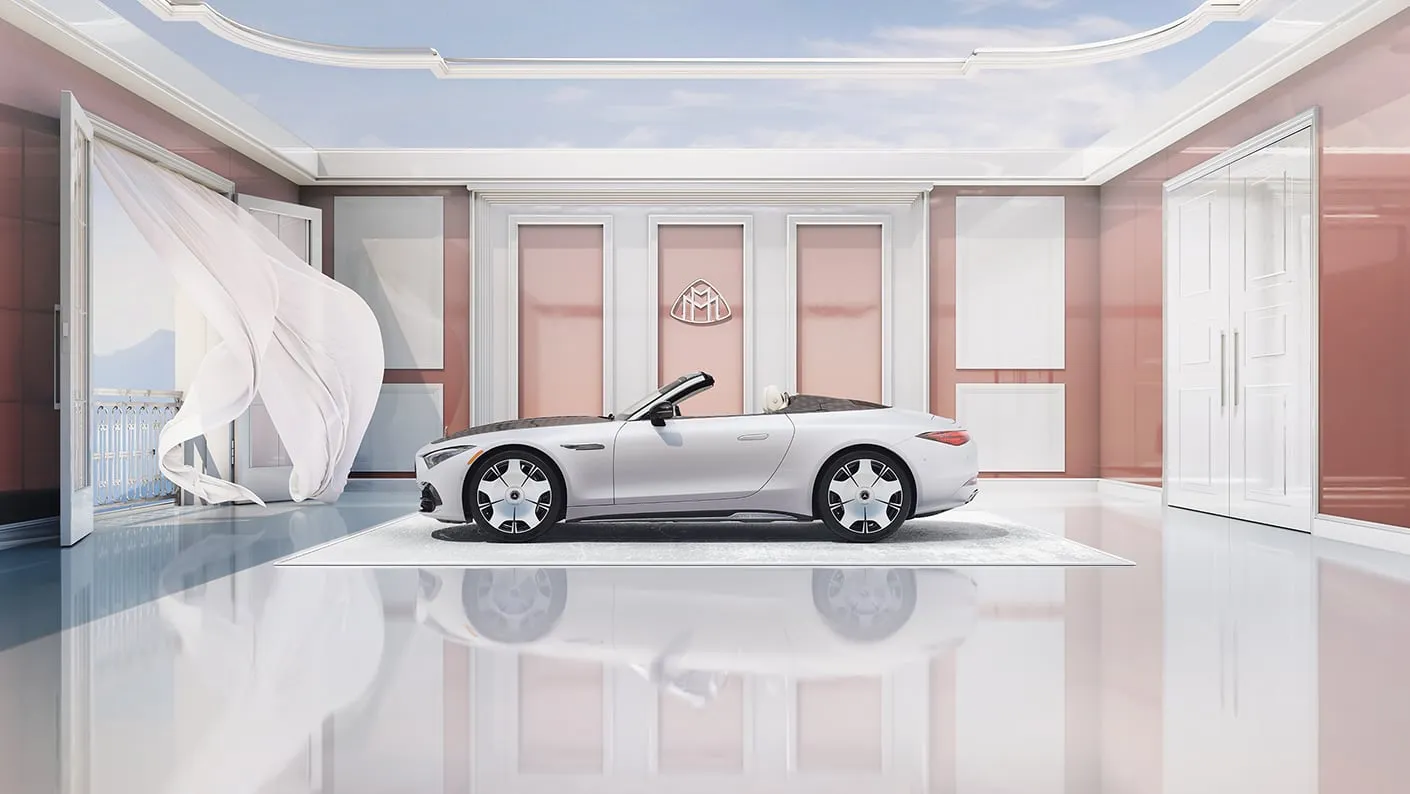 Mercedes-Maybach SL Monogram convertible in opulent white finish, showcased in an elegant Maybach suite with open-air design.