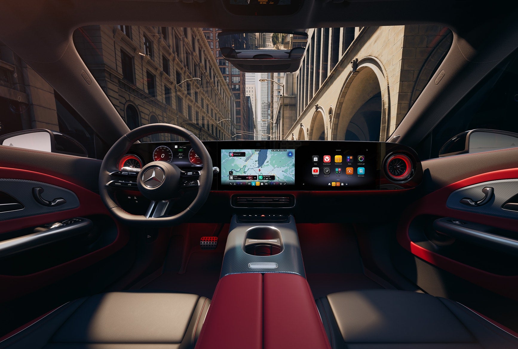 Interior of the 2027 Mercedes-Benz CLA Sedan showing the next-generation Mercedes-Benz operating system, widescreen dashboard, steering wheel, and red-accented cabin.