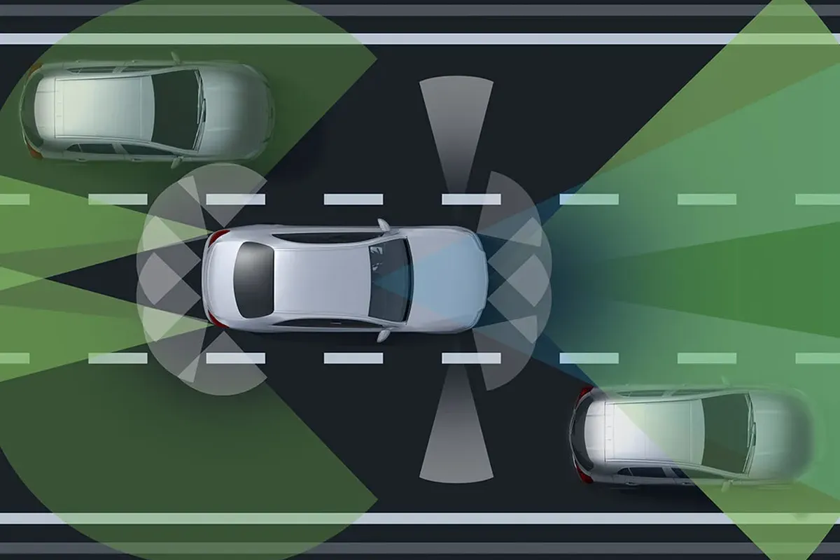 Illustration of the Mercedes-Benz S-Class Intelligent Driver Assistance system, showing 360-degree safety and monitoring sensors.
