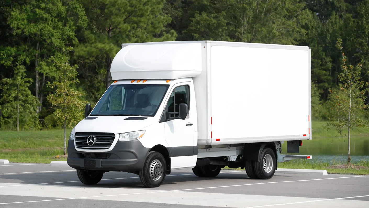 Black Mercedes-Benz Sprinter parked in a city environment highlighting compact commercial utility.