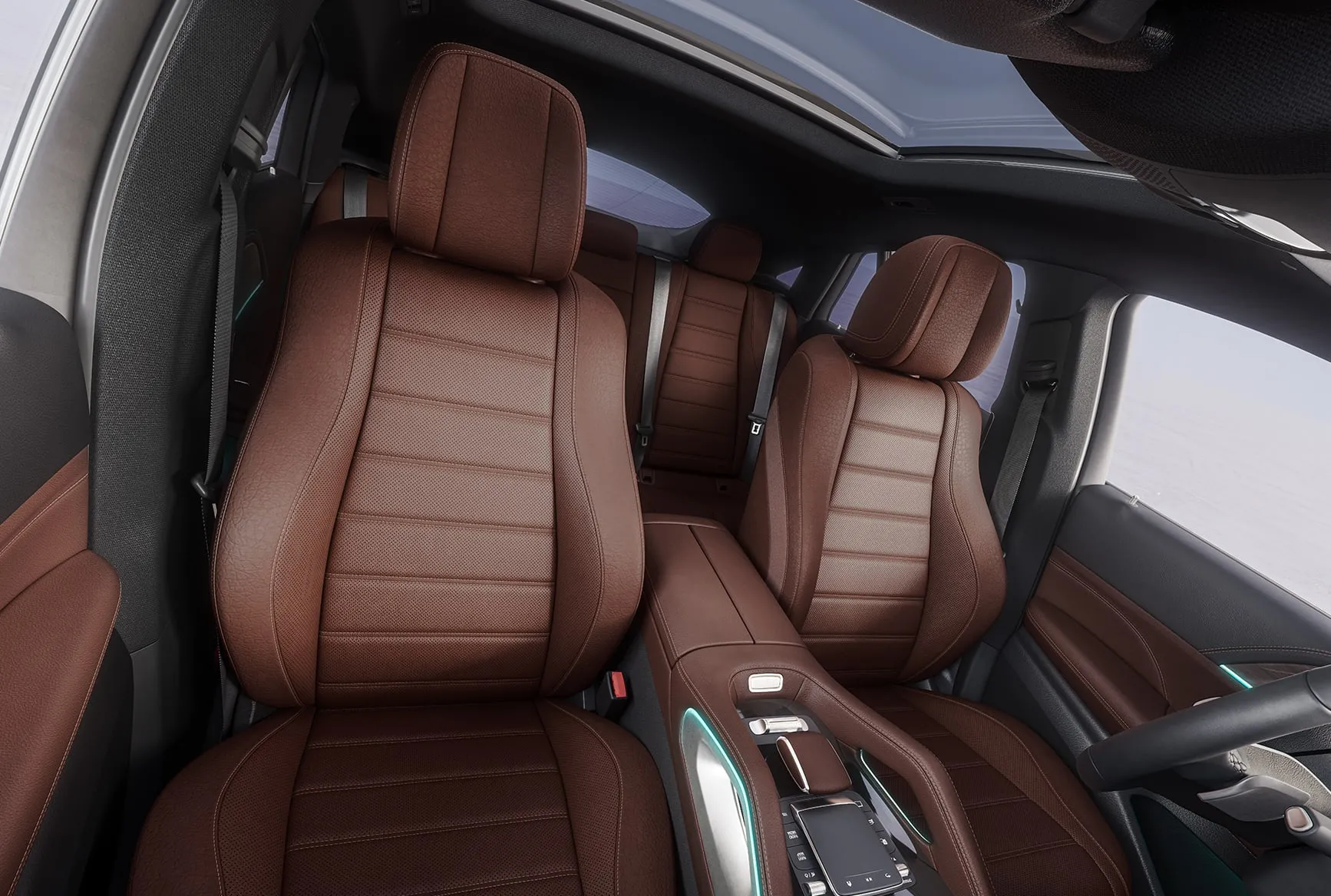 2027 Mercedes-Benz GLE Coupe interior with brown leather seats, panoramic roof, and premium cabin details.