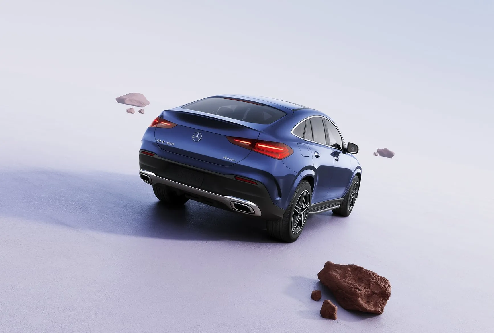 2027 Mercedes-Benz GLE Coupe rear view in blue with coupe roofline, taillights, and sporty SUV styling.