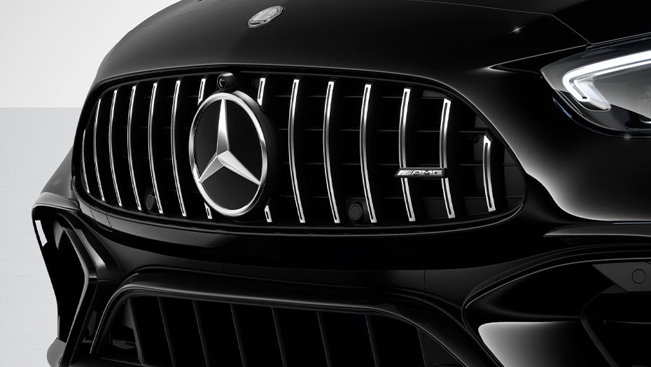 2027 Mercedes-Benz C-Class Electric front grille close-up with Mercedes-Benz badge and sleek black styling.