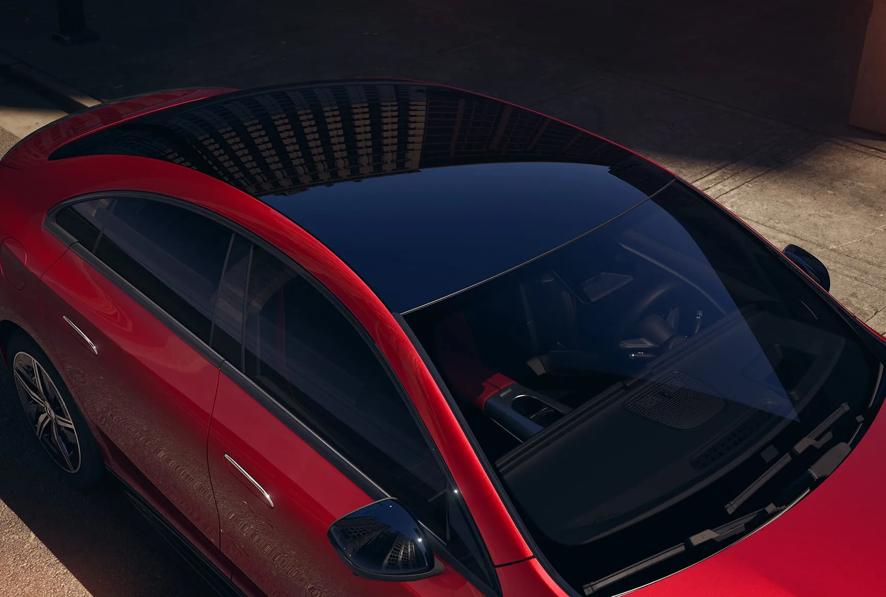 Mercedes-Benz CLA 350 with panoramic glass roof emphasizing aerodynamic, performance-focused design and luxury craftsmanship.