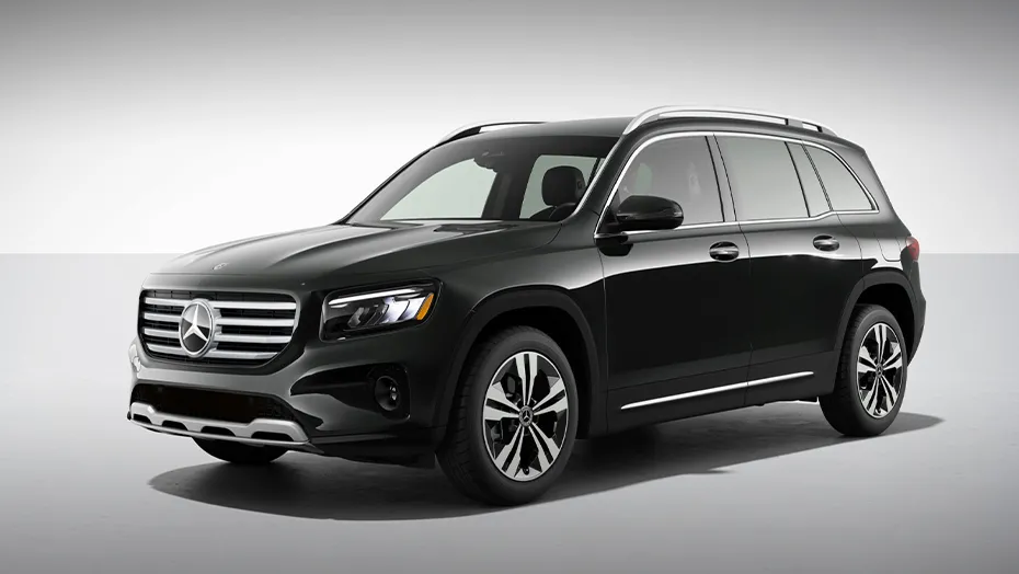 Black Mercedes-Benz GLB shown from the front side angle with a bold grille and compact luxury SUV styling.