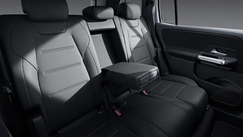Mercedes-Benz GLB optional third-row seating area with black leather seats and fold-down center armrest.