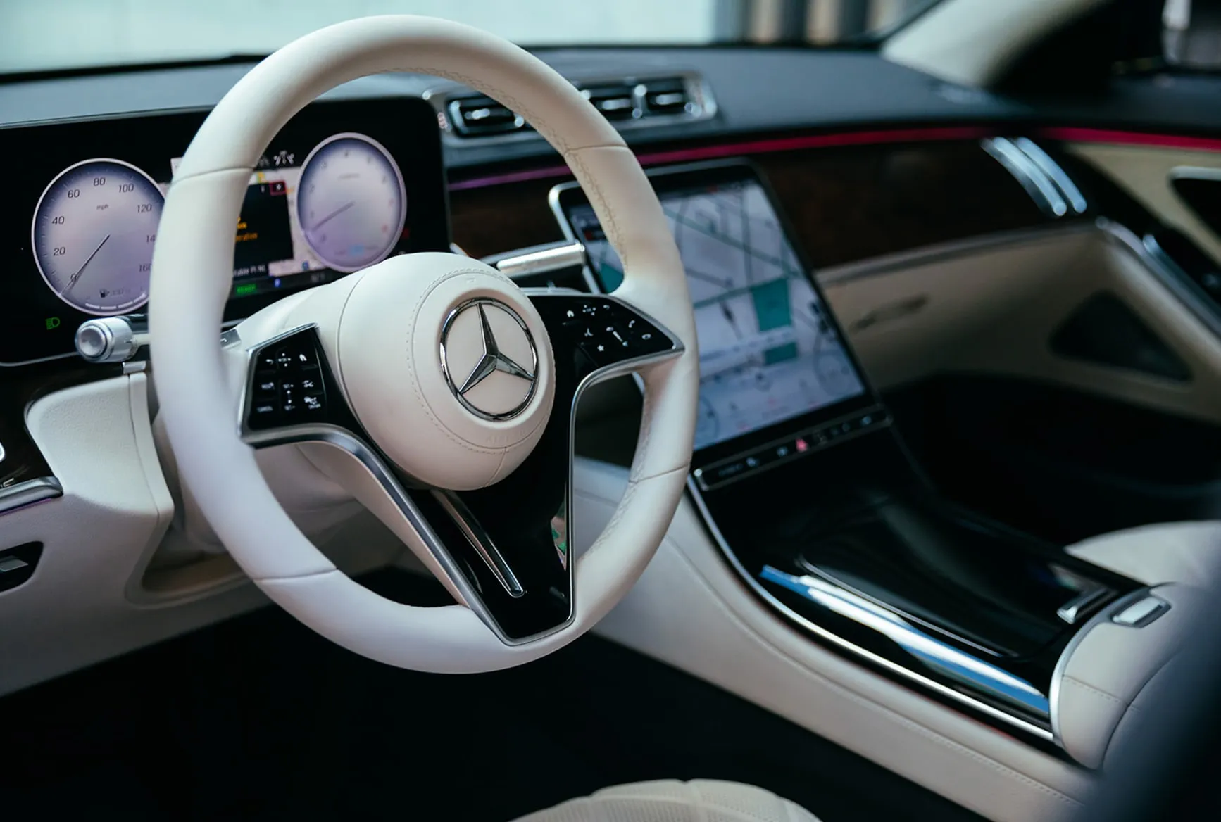 Mercedes-Benz S-Class interior dashboard with digital display and luxury steering wheel